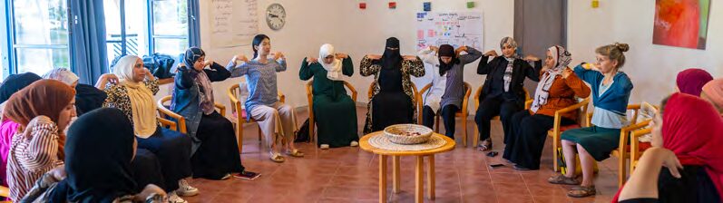 Female SEKEM employees in conversation